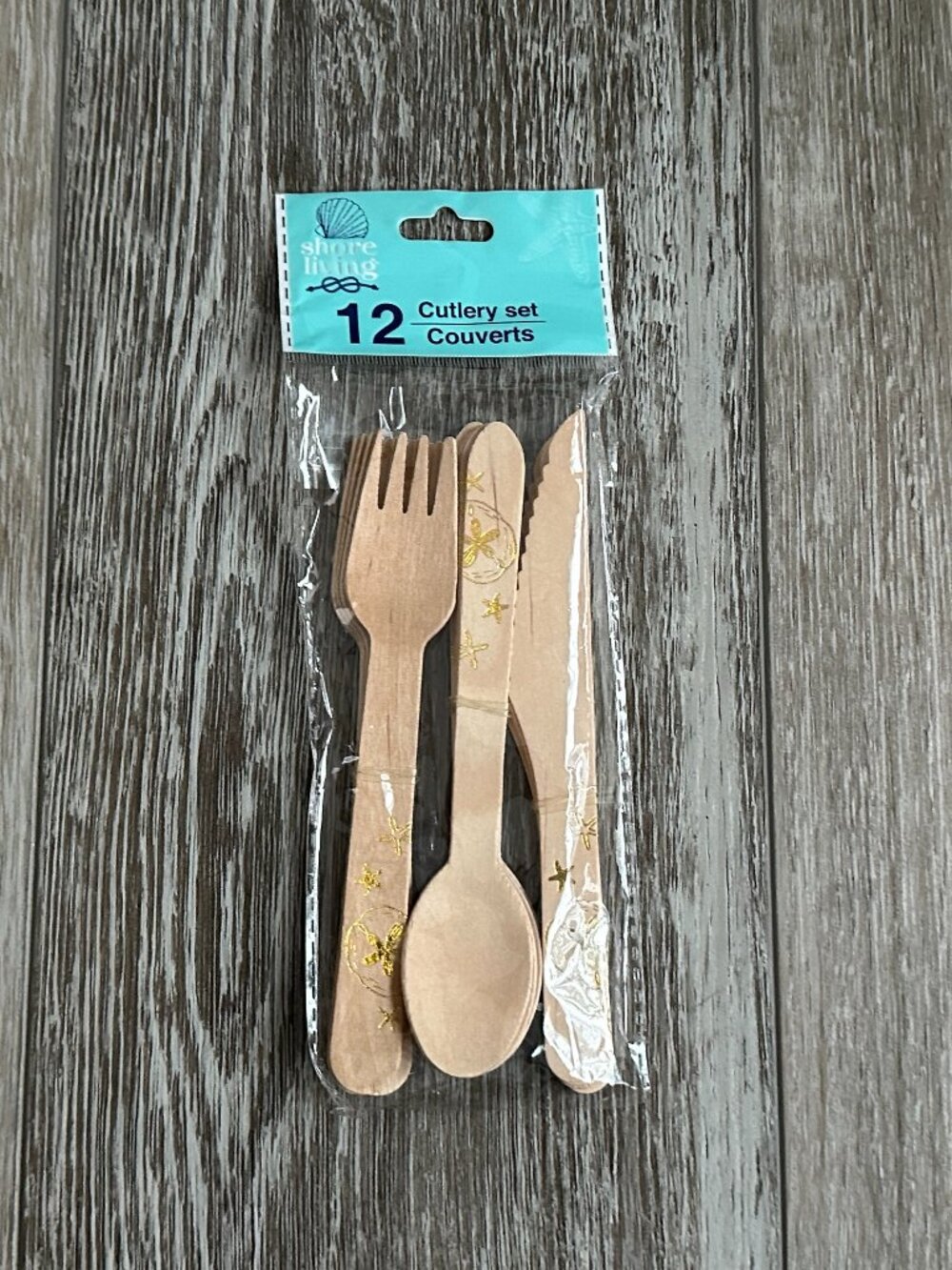 NWT Shore LIving 12 pc Cutlery Set Wood Silverware w Gold Starfish etc Design
